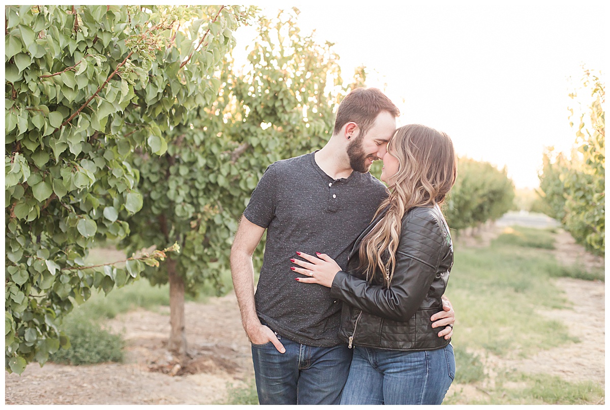 Couple kissing Gilcrease Orchard
